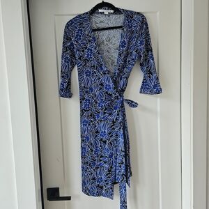 New without tags Diane Von Furstenberg Blue and Black Floral Wrap Dress